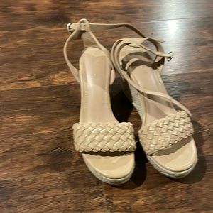 Gently used cream wedge size 8 ties at the ankle. Great with a spring dress